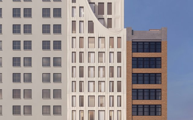 Manhattan — boutique residential with sculpted cast-stone ribbon facade in the Flatiron District